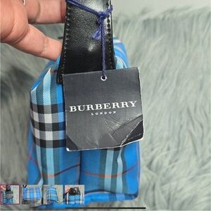 Burberry Blue and Black Plaid Wristlet, (NWT). missing a snap. Can be fixed